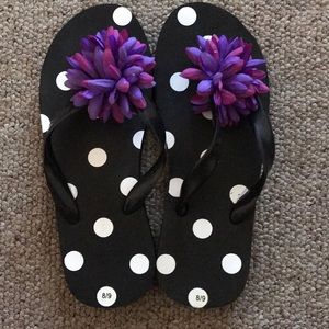 Black polka dot and purple floral flip flops 8/9